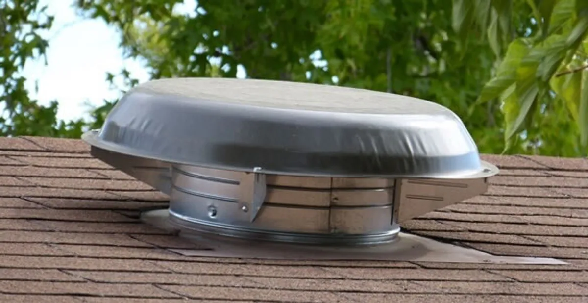 attic fan installation services with low-profile roof ventilation unit in Fort Lauderdale, FL