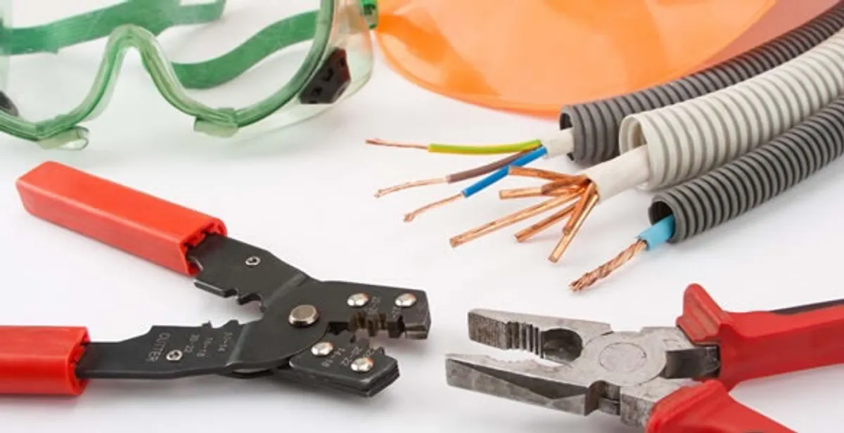 Electrical wiring repair with professional tools and safety equipment in Dania, FL