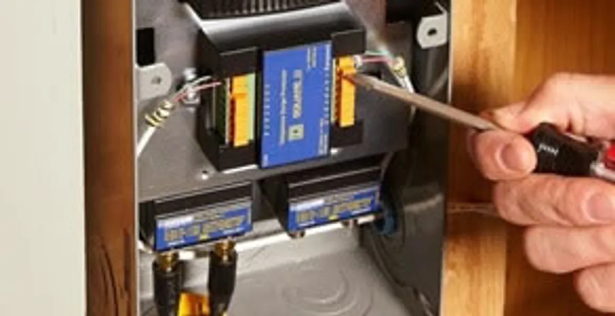 Whole home surge protection device being installed by a licensed electrician to protect electrical systems in Fort Lauderdale, FL